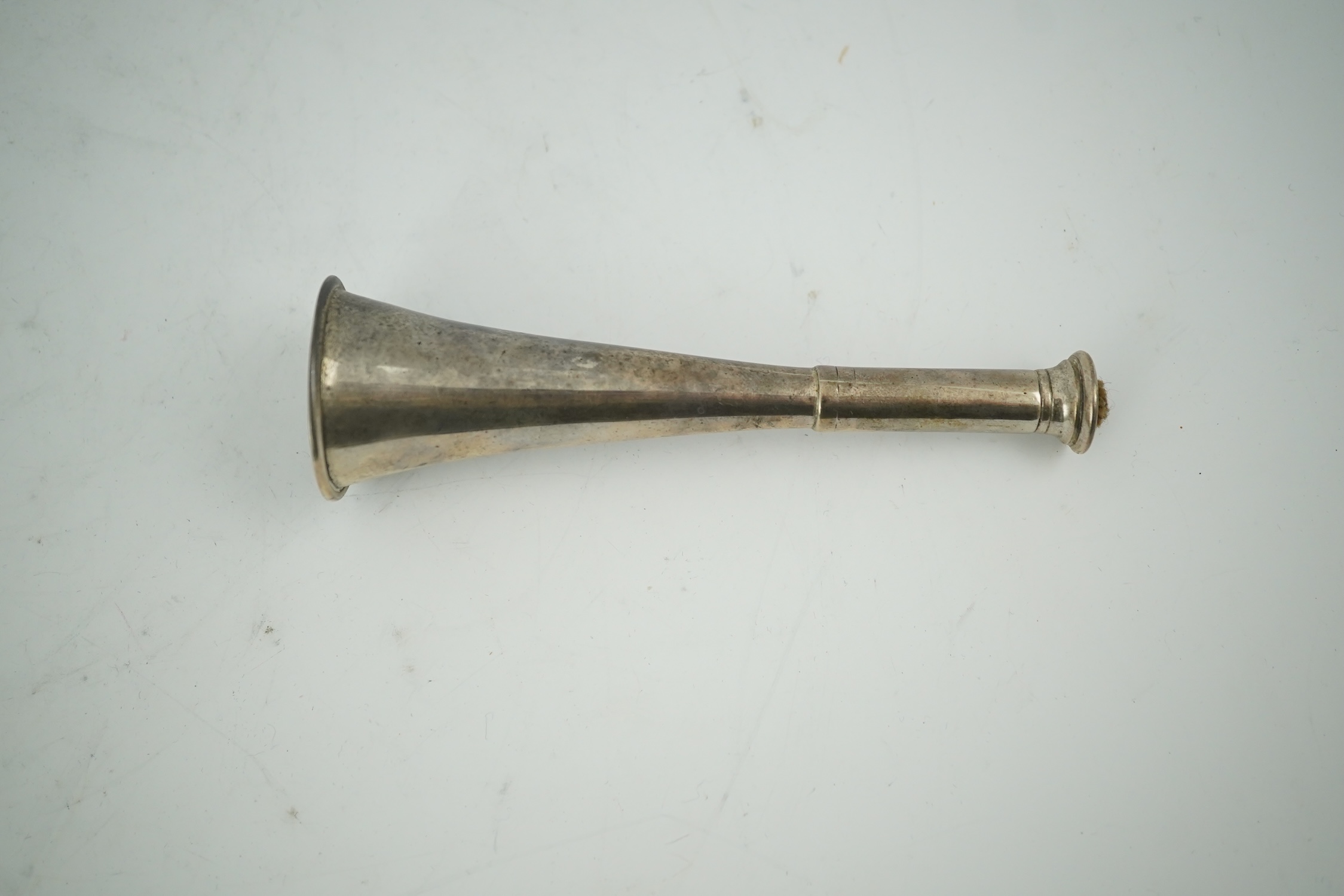 A late Victorian novelty silver club lighter, modelled as a hunting horn, London, 1892, 12cm. Condition - poor to fair